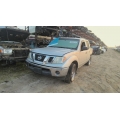 Used 2009 Nissan Frontier Parts Car - Silver with gray interior, 6-cyl engine, automatic transmission