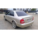 Used 2003 Mazda Protege Parts Car - Gold with tan interior, 4 cylinder engine, automatic transmission